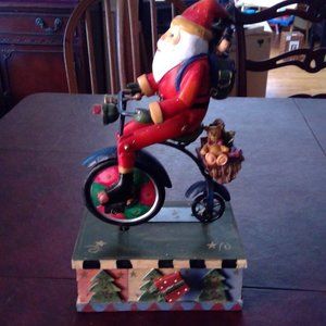 Musical moving Santa figure